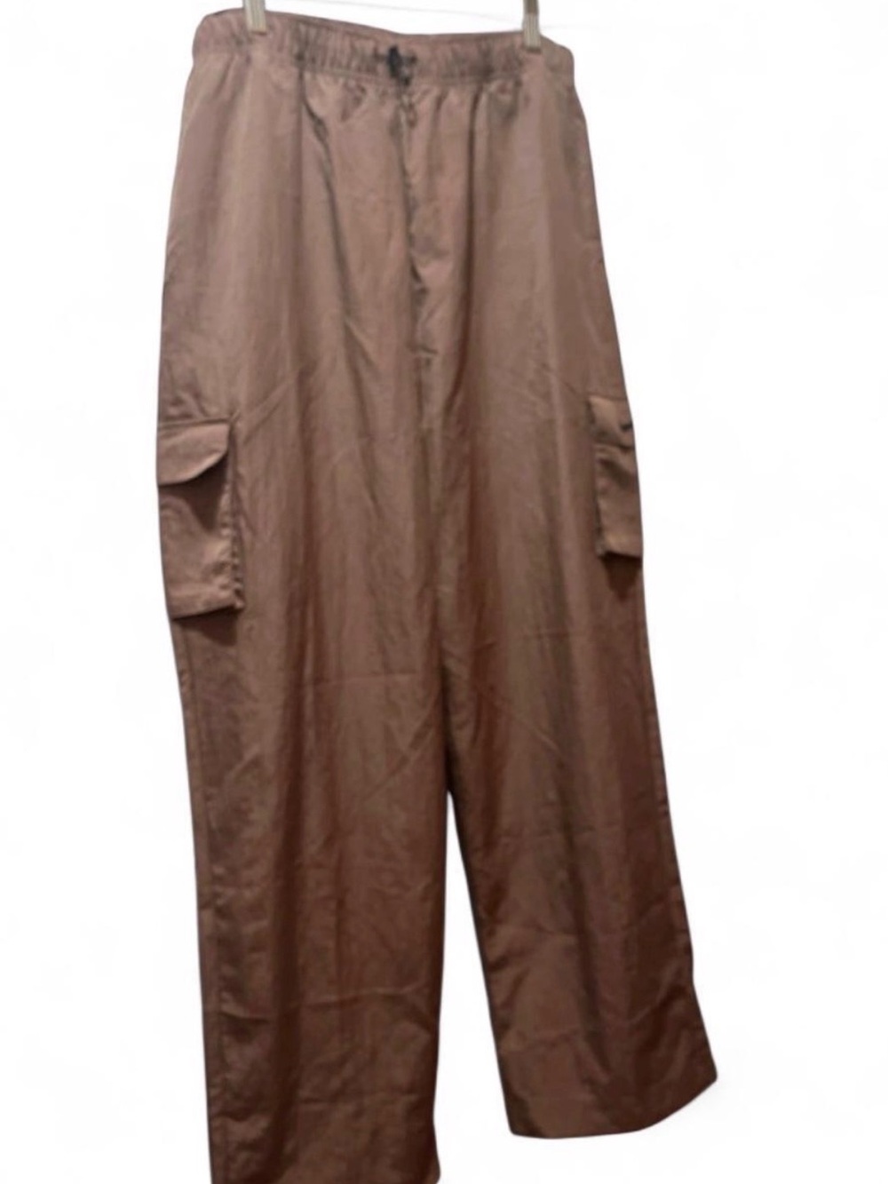 Nike women’s track Pants in mauve color. Size S. New without tags.
